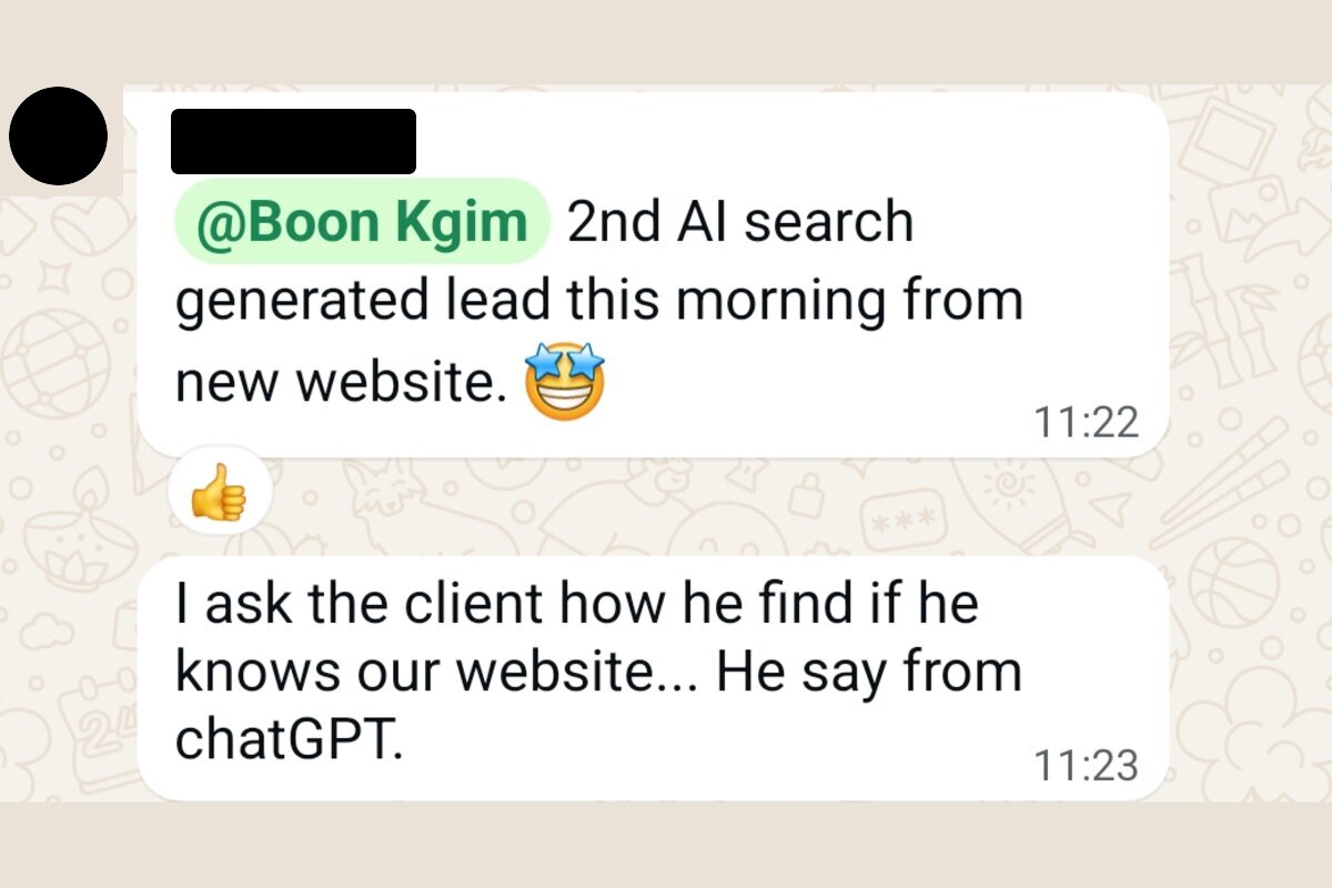 An alumnus messaging the group that a second lead came from AI search, and the client said they found the site through ChatGPT